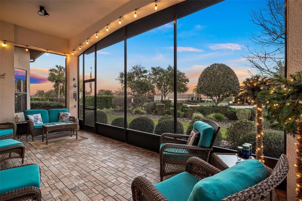 Enjoy cobblestone tile pavers on back screen porch...