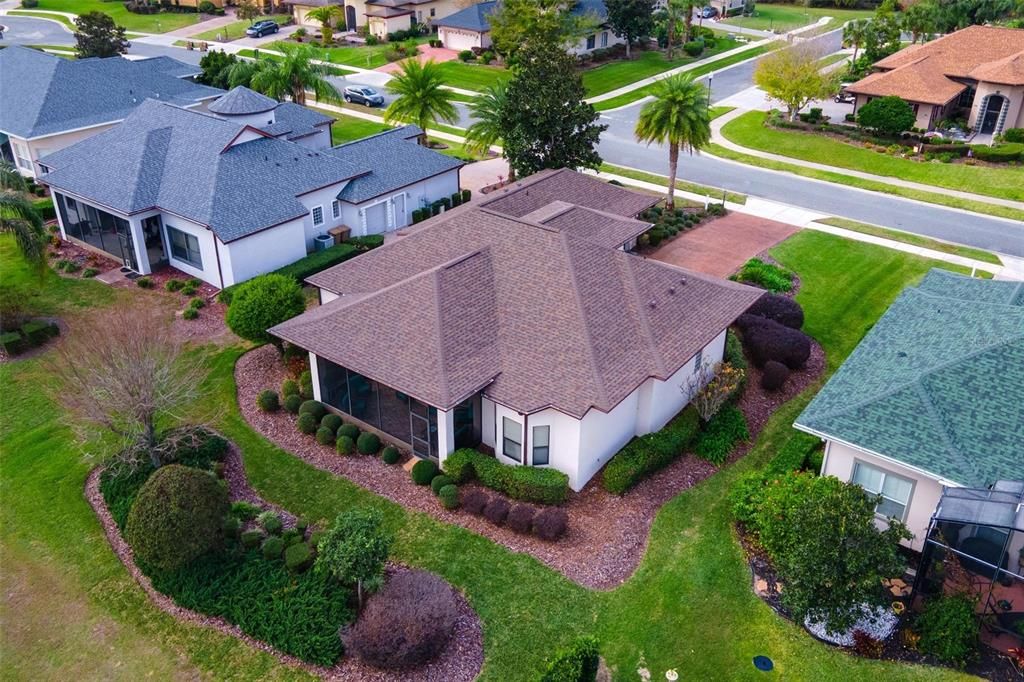 Rear of home and plush lawn landscaping!