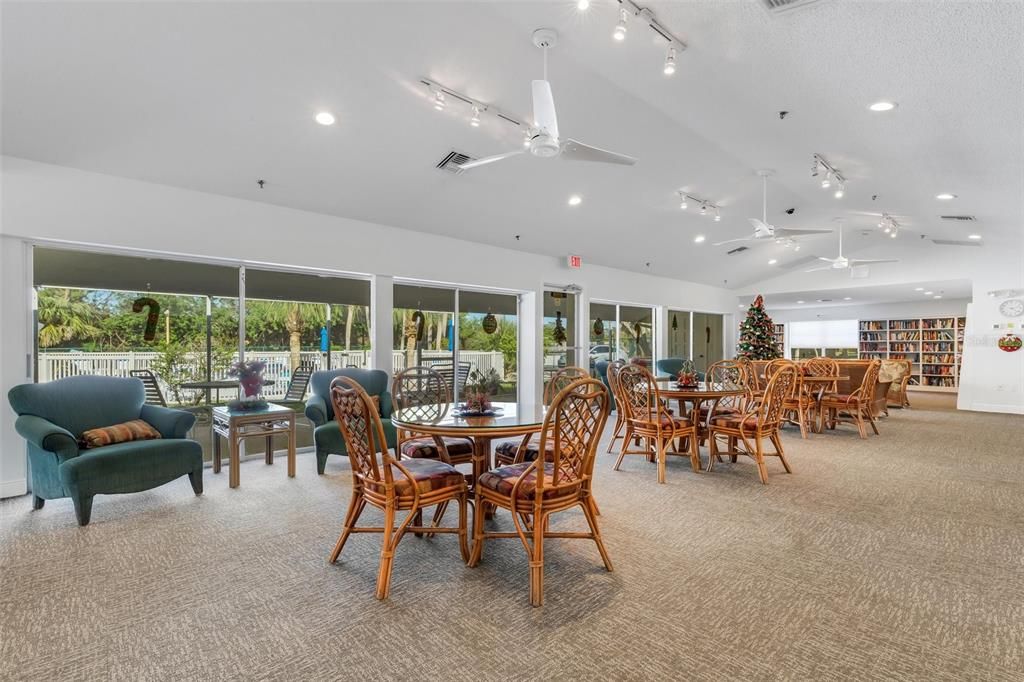 clubhouse area facing pool and grills