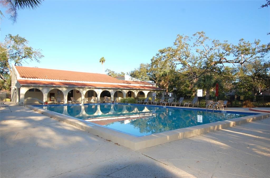 Assigned covered parking spot with uncovered spaces for guests