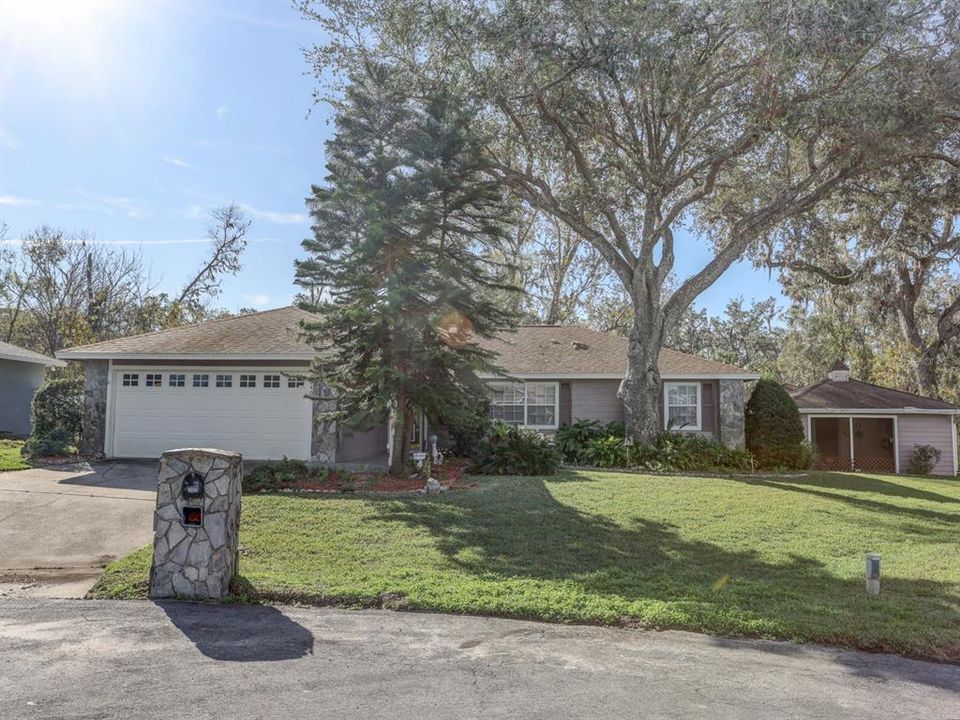 Front of the home with a 2 car garage.