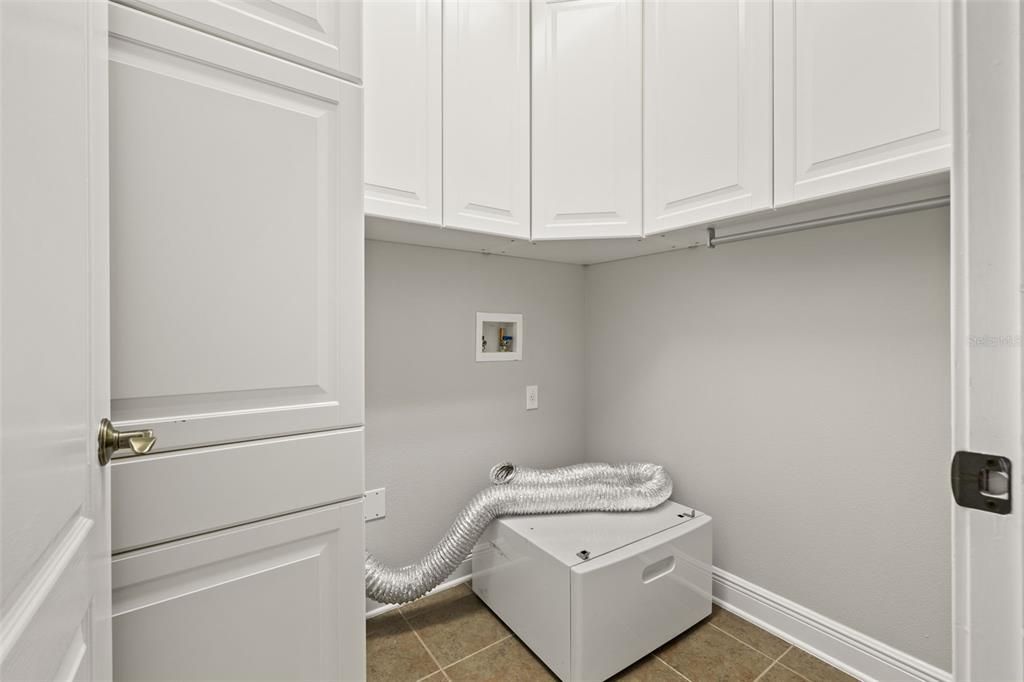 Laundry Room with cabinets storage