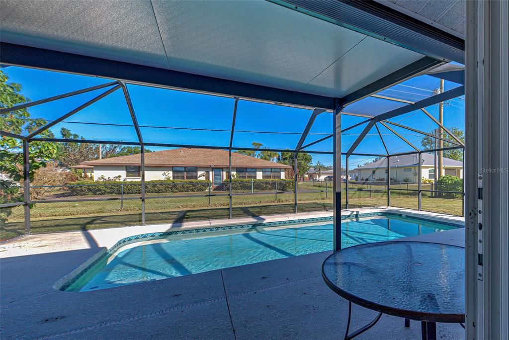 There is room on the lanai for a table and chairs for outdoor dining and relaxing in the shade.