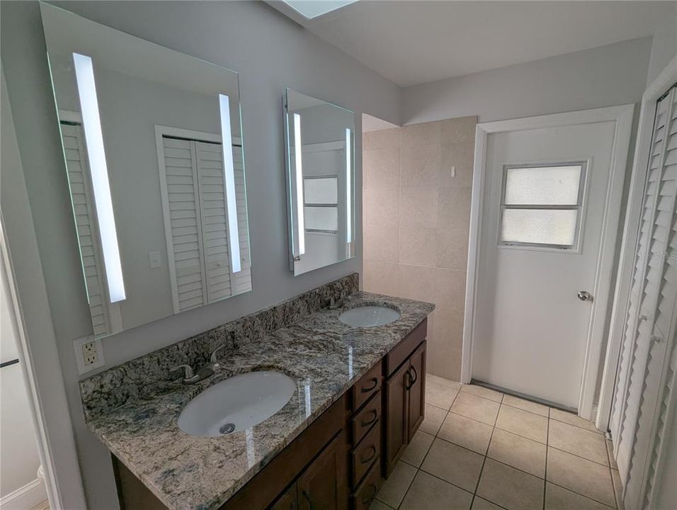 Primary Bath with granite counters and dual sinks