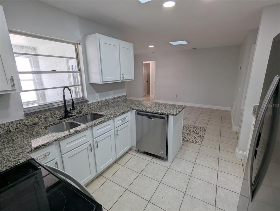 Kitchen pass-through window to large rear porch