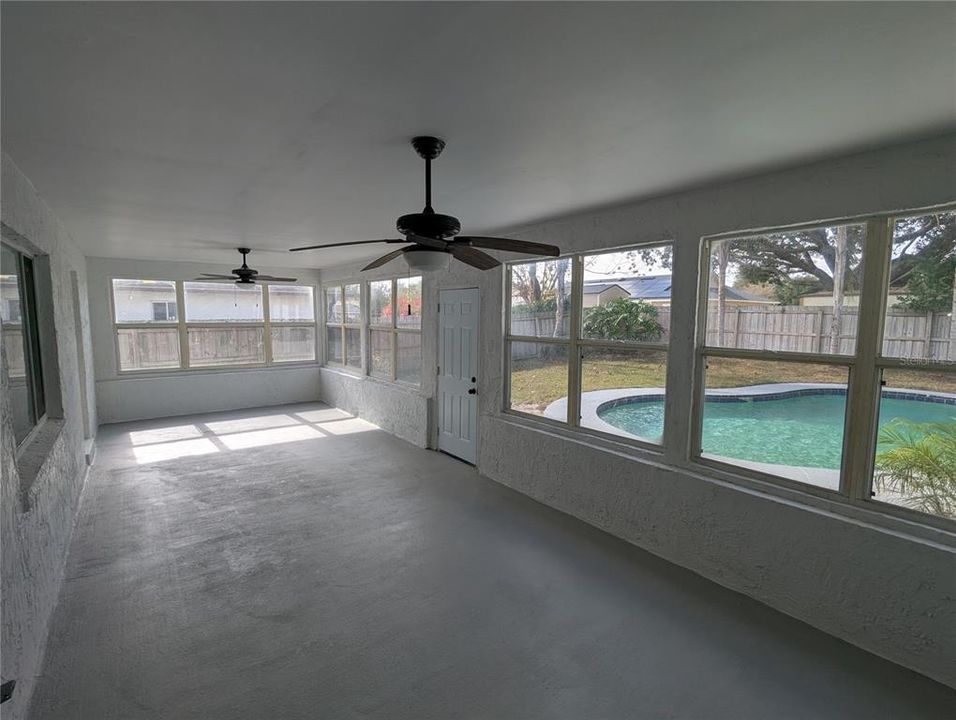 Expansive porch overlooking the pool