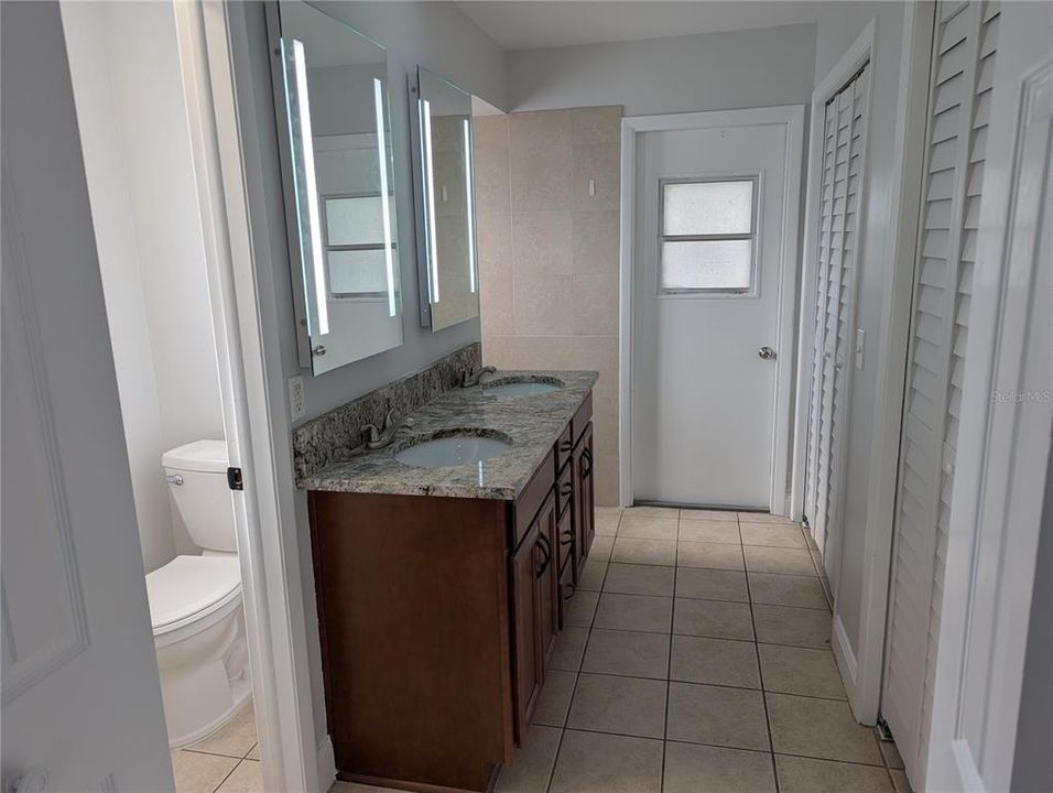 Primary Bath with door out to the rear porch