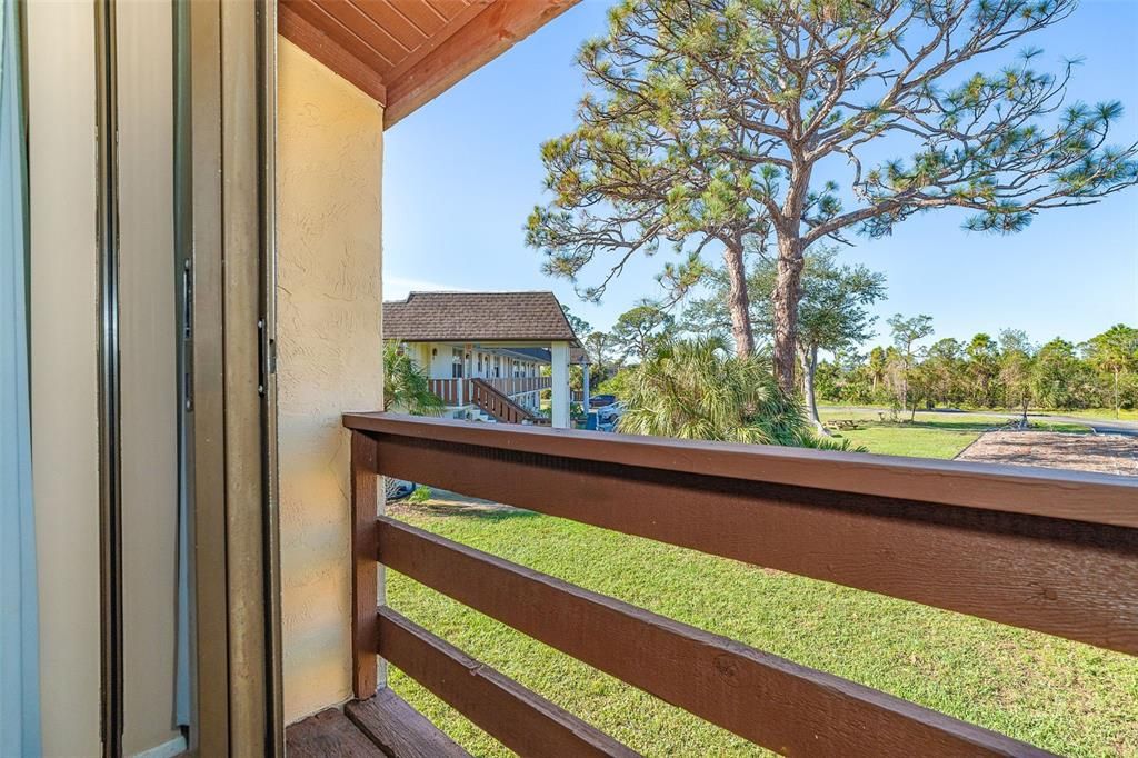 Bedroom 2 with balcony and lanai access