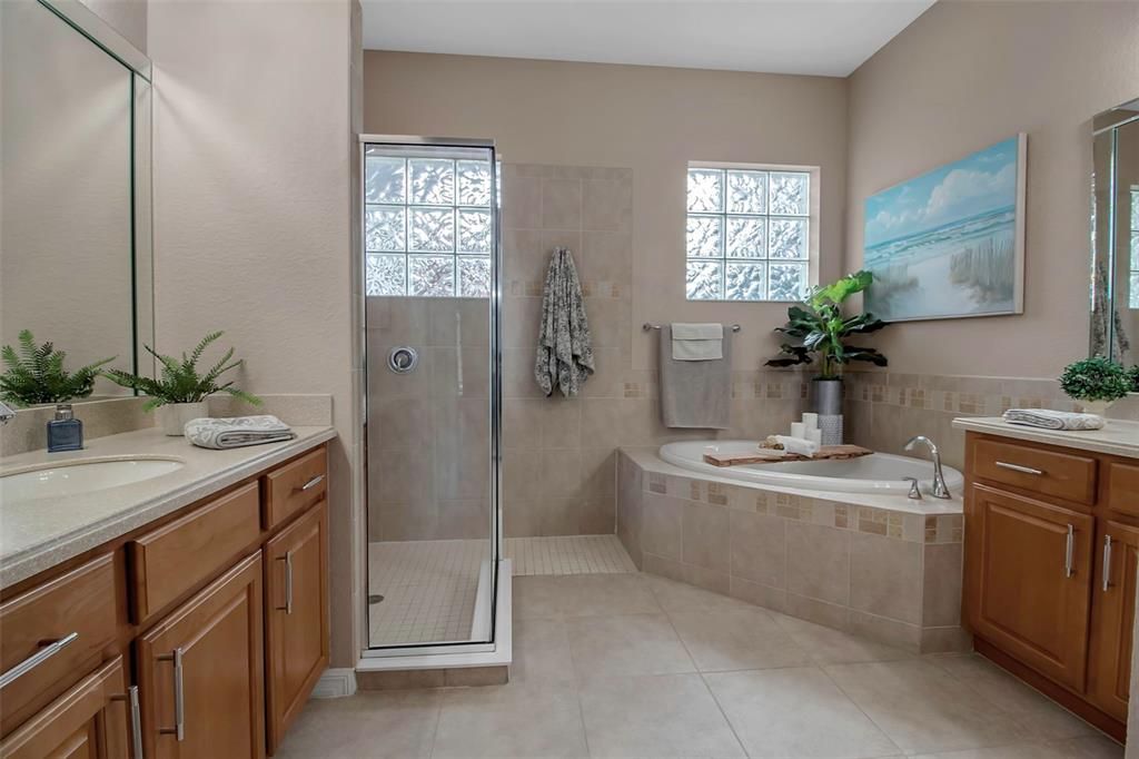 Primary bathroom with split vanities