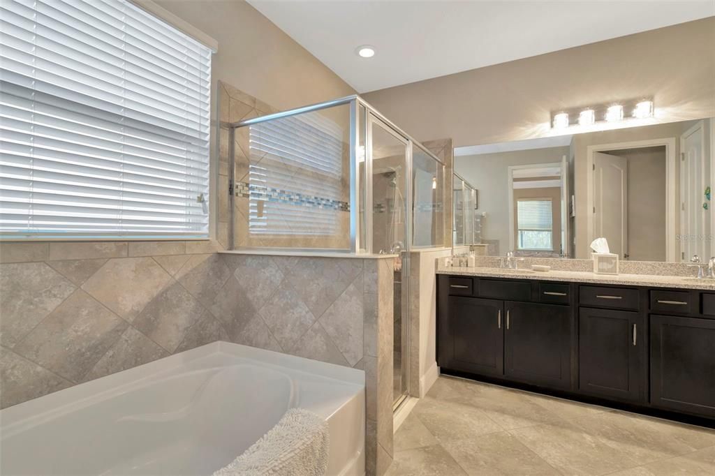 Master Bath with Tub and Glassed Shower