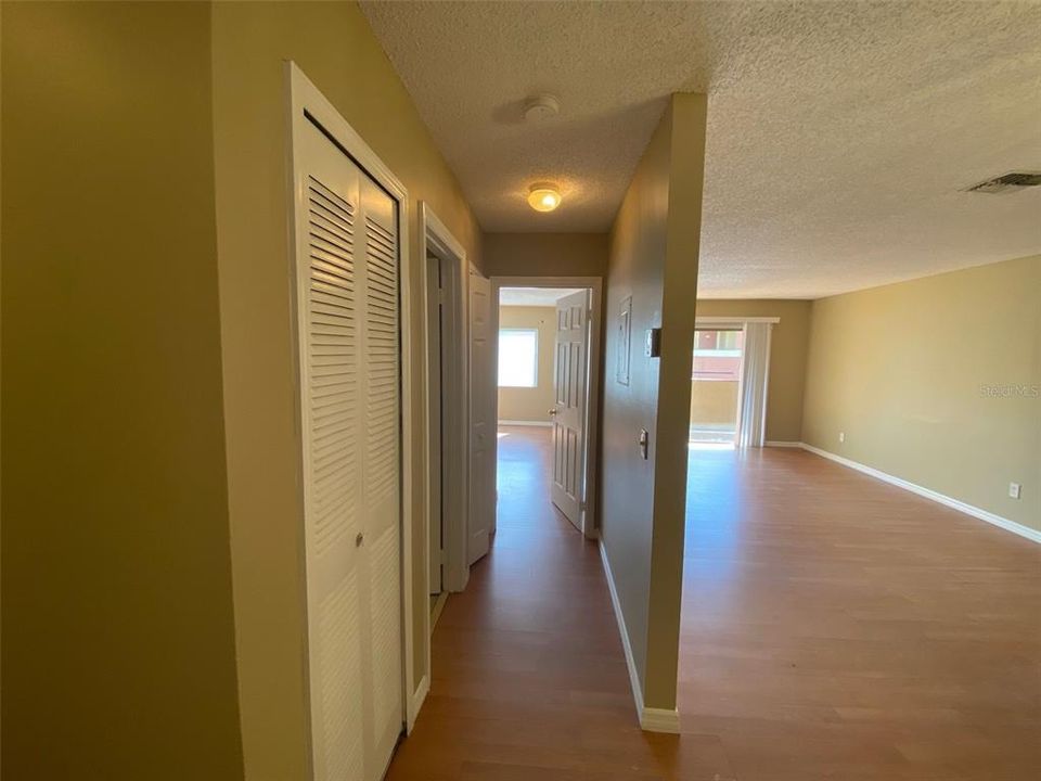 Hall to 2nd Bedroom and 2nd Bath with Linen closet