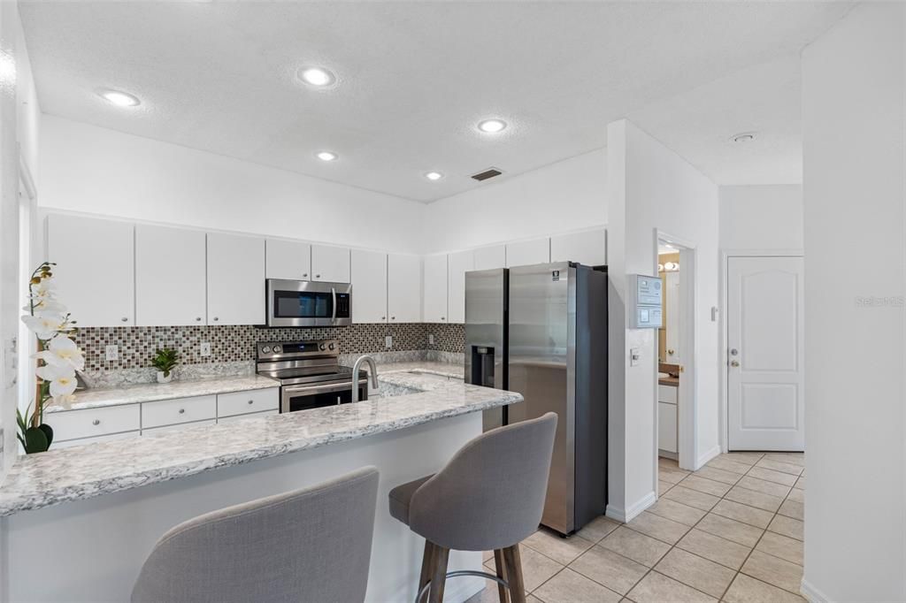 Kitchen has stainless appliances