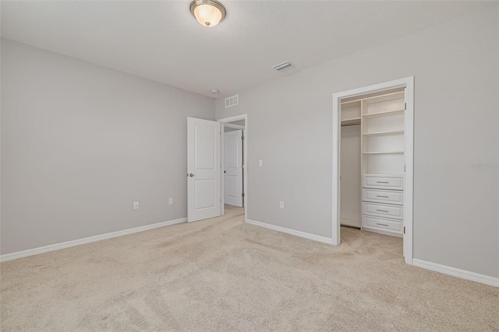 Guest Bedroom 2 Custom Shelving in Closet