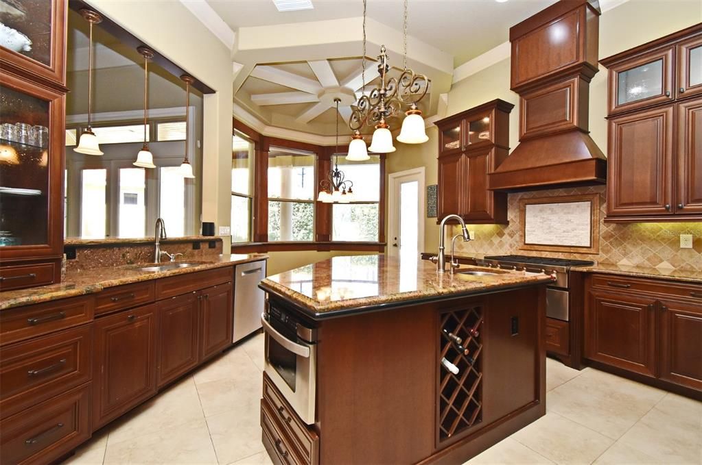 Kitchen with Glass Cabinets & Undercounter Microwave