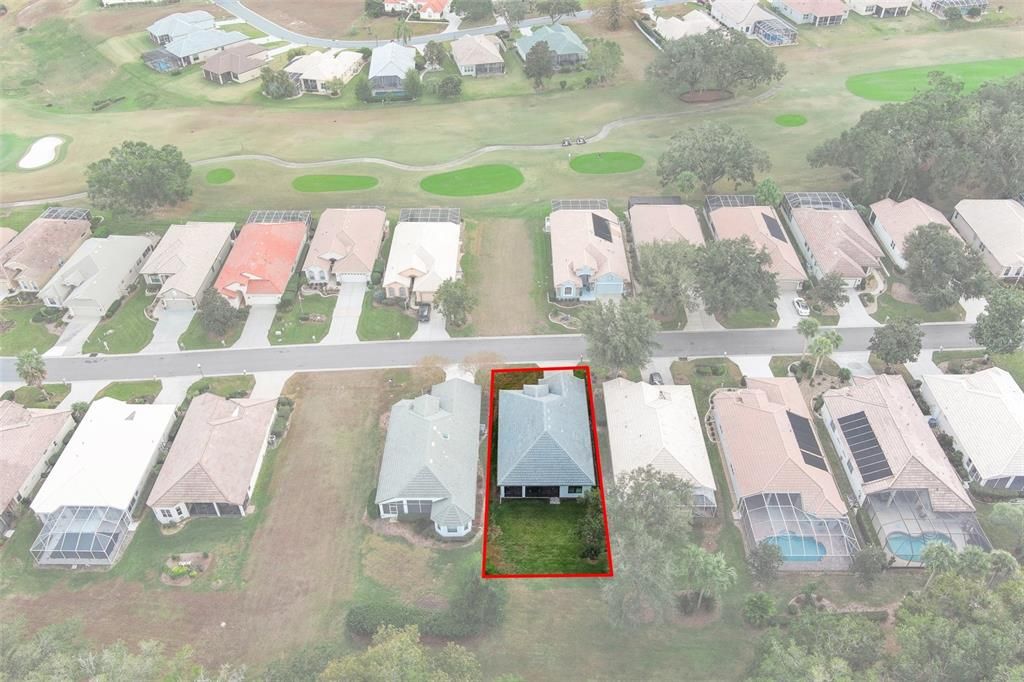 The aerial view from the back of the house, with an estimated overlay of the property boundary. FYI, the property setback is 5 feet from either side.