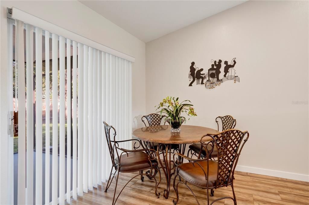 dining area with sliding door to lanai