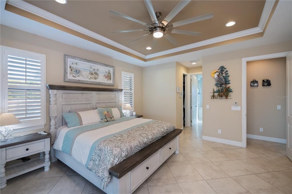 Primary bedroom with coffered ceiling