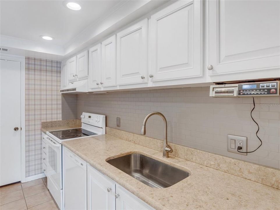 Upgraded White kitchen with granite counter top