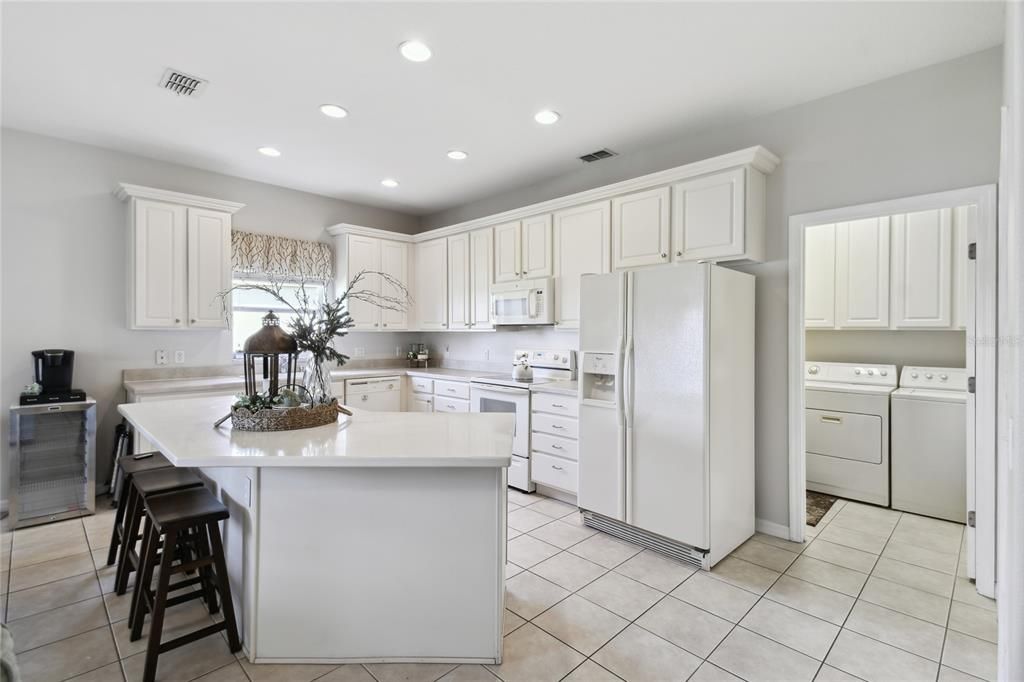 Well lit Kitchen with massive island