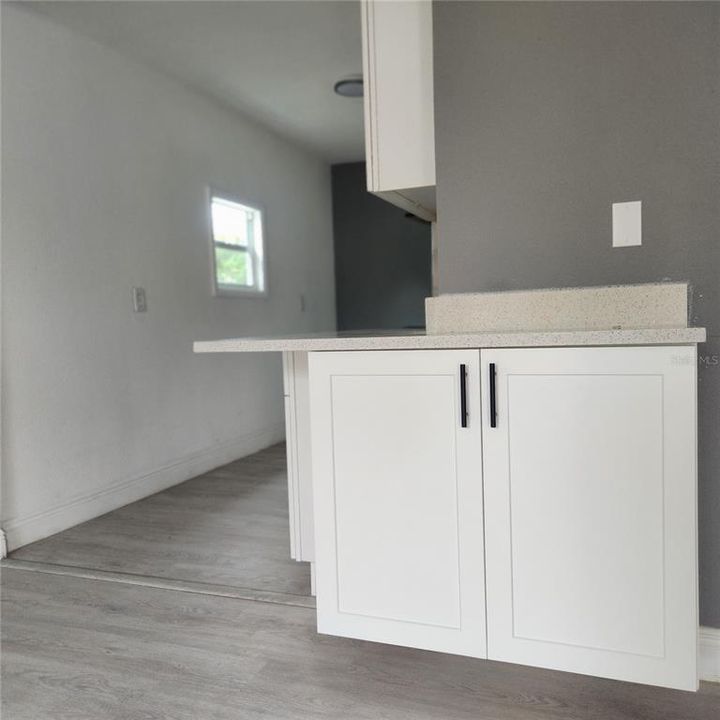 Built in sideboard provides storage and seving space for the dining area.