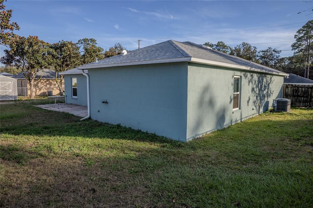 Back and side yard from east