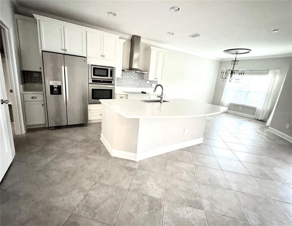 Plenty of storage in this pretty white kitchen you'll love