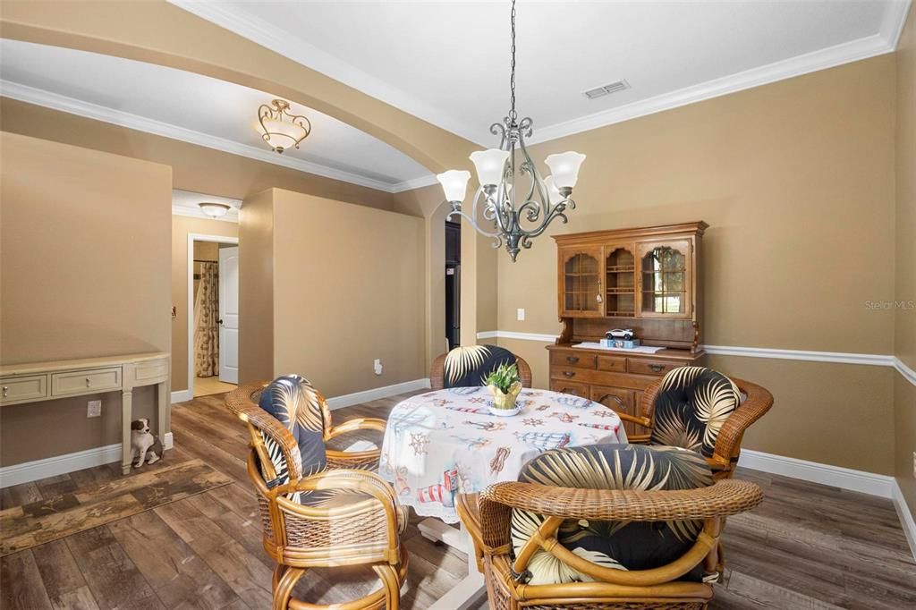 The details: chair rail, bullnose, arched drywall, 5" baseboards, and crown molding are just a small part of what makes this home so special.