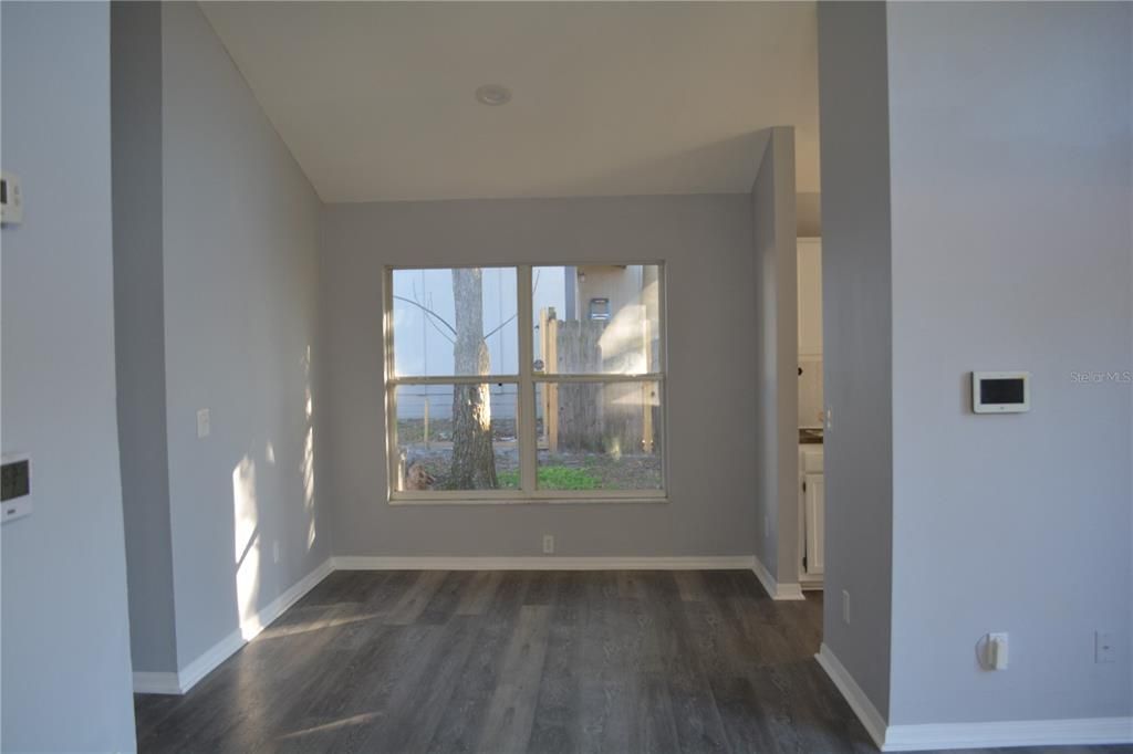 Enjoy two dining areas in this house. This view is the formal dining open floor plan.