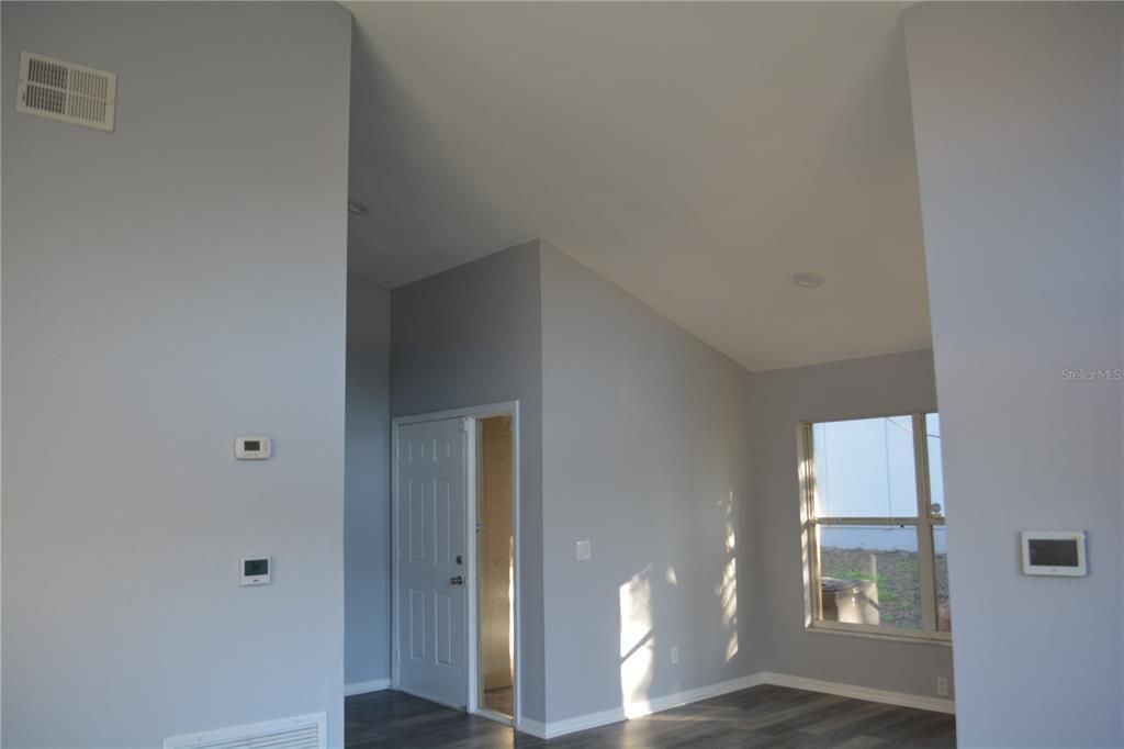 Come into the foyer from the front door with beautiful glass view and an open floor plan