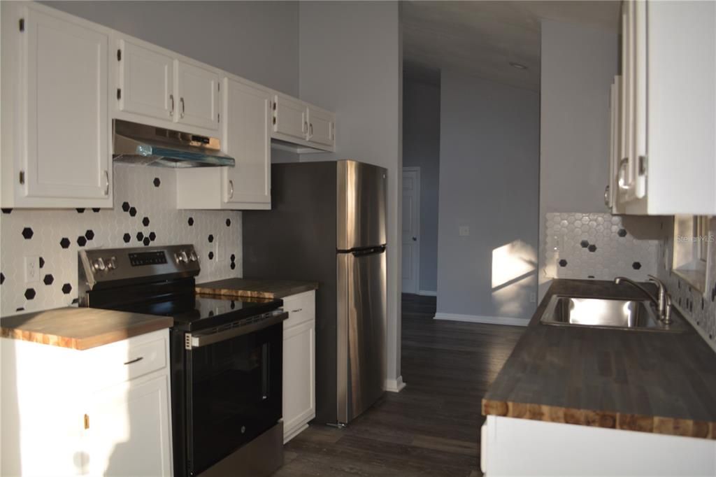 Looking through the kitchen into the dining area