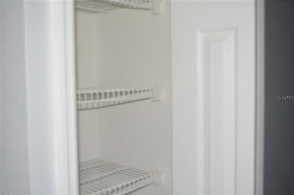 Extra closet for storage in the hallway of the house