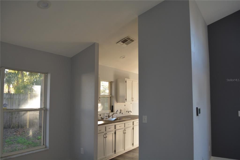 View from the formal dining room into the kitchen