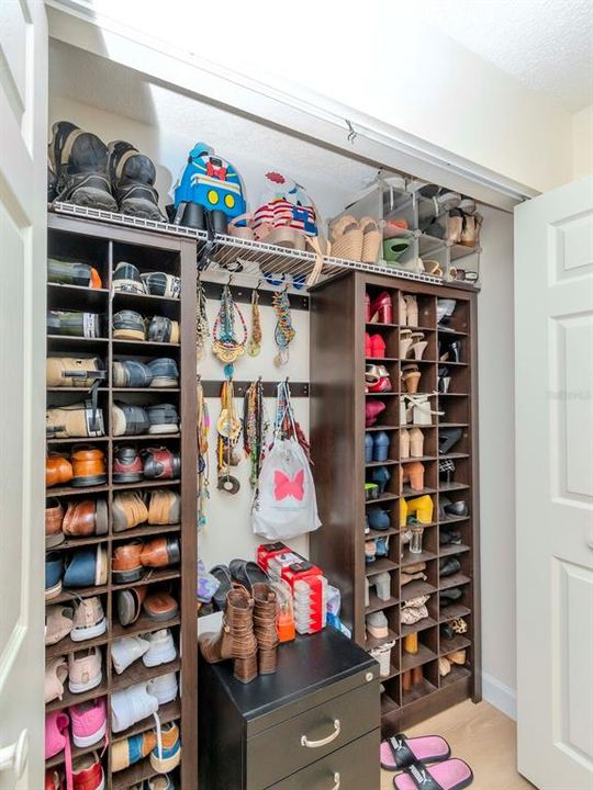 Built-in shoe rack in the primary bedroom closet