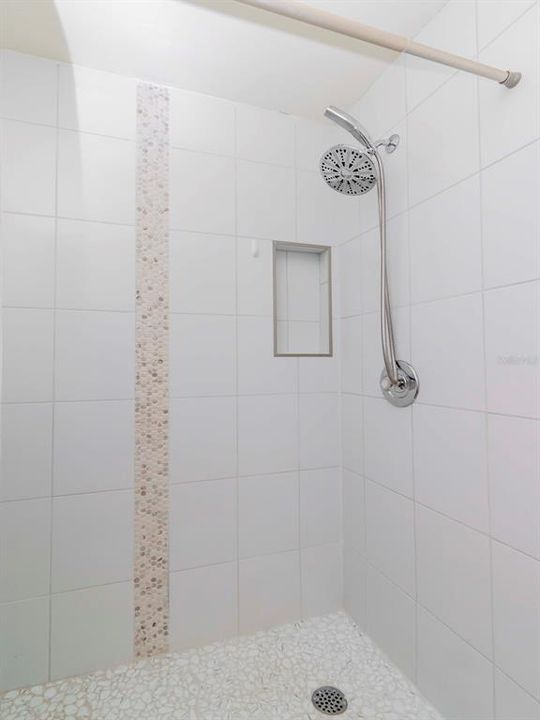 New walk-in shower in the guest bedroom