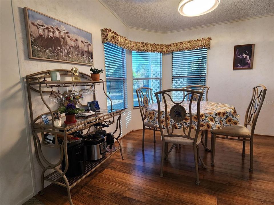 DINING ROOM WITH BAY WINDOWS