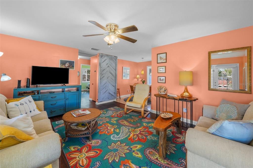 Cheery Living Room with barnwood accent wall