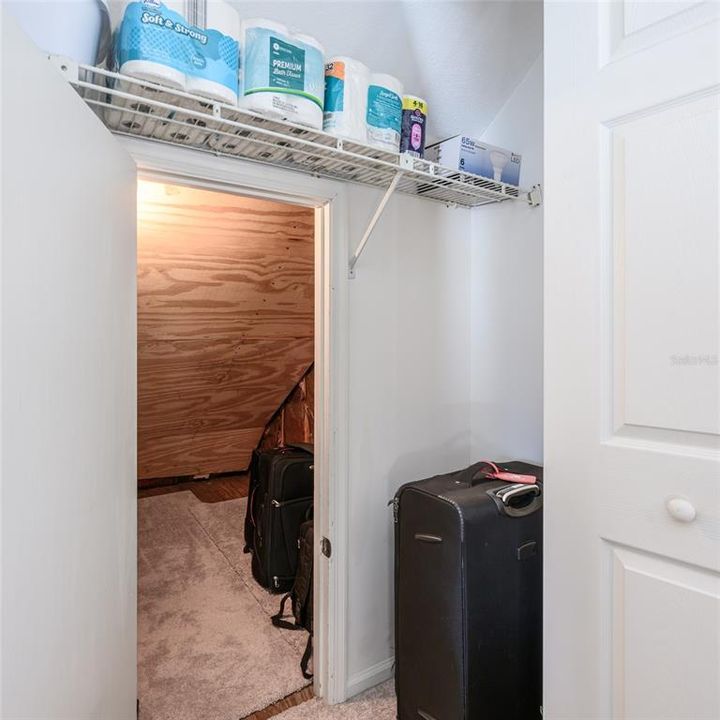 Behind the laundry room is a storage.