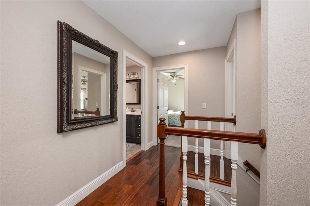 2nd floor landing with the same engineered hardwood flooring.