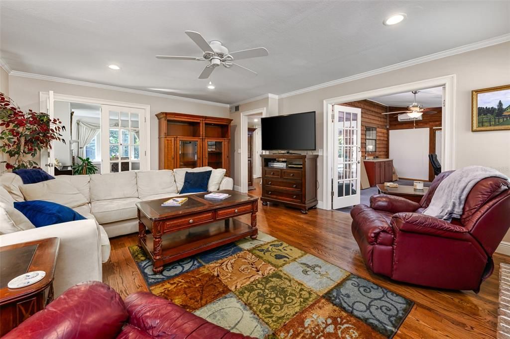 The family room opens out to the Florida room through the french doors.