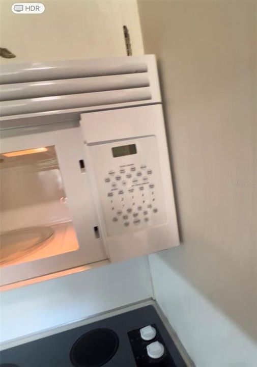 Newer Overhead Microwave and Cooktop Stove