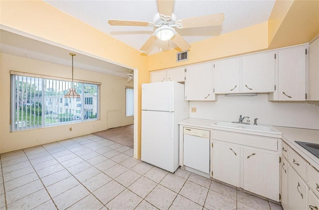 View to Florida Room Kitchen picture before new LVP flooring