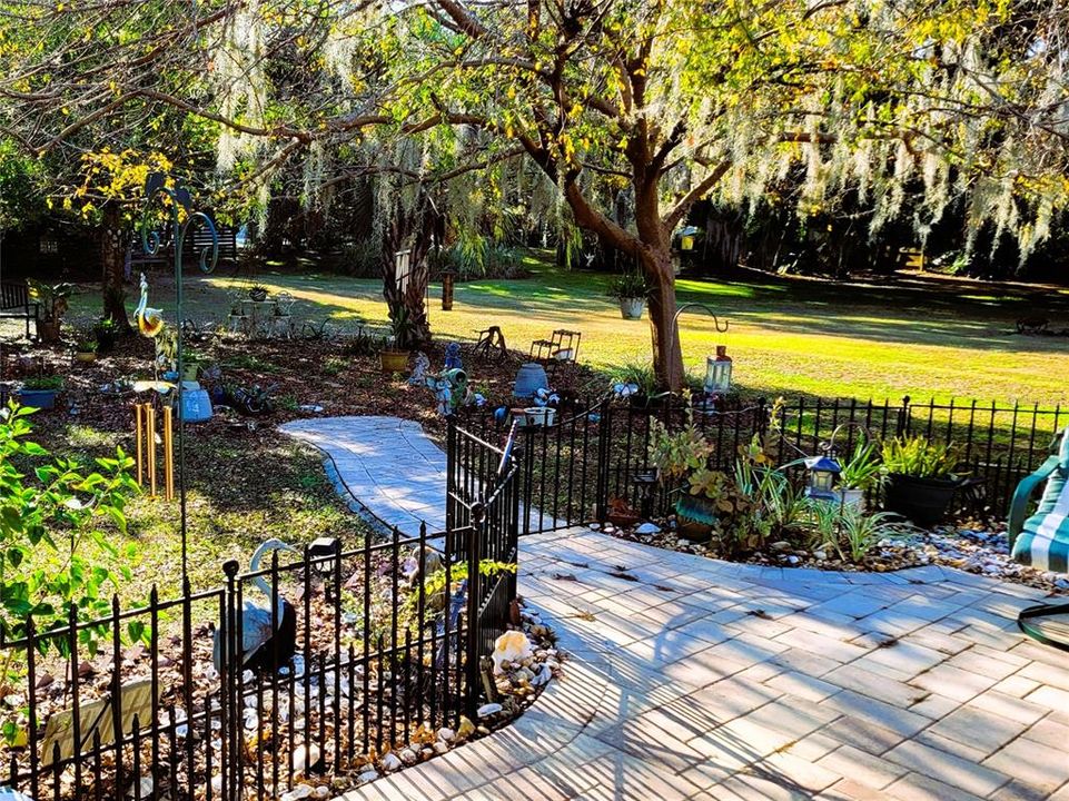 Bonus room leads out to back patio and garden