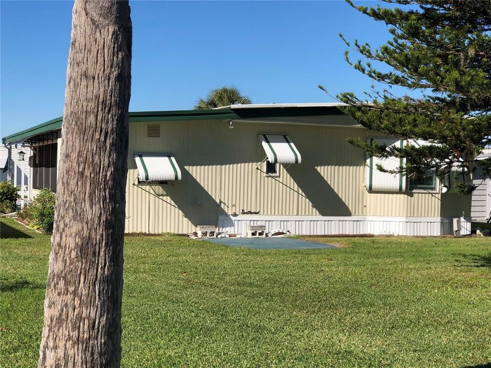 Back of home shows large backyard