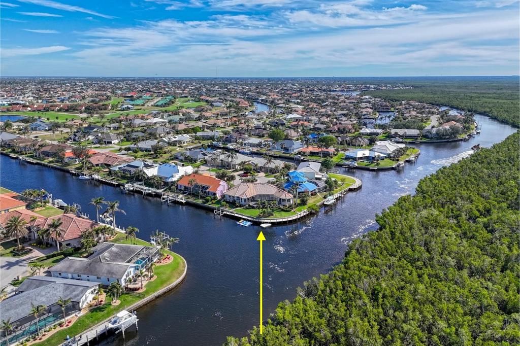 Intersecting canal and pie shaped lot over 170 ft of waterfront