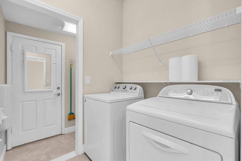 Laundry Room off of garage and living room | 368 Cedar Falls Dr, Apollo Beach, FL  33572