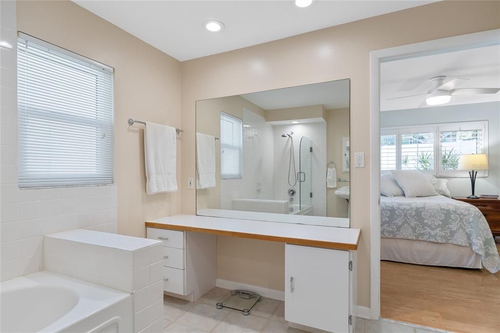 Separate vanity area in primary bathroom, perfect for putting on your make up or styling your hair etc.