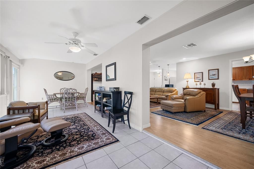 This bonus space/family room/sunroom at the back of the home has so many potential uses!   What will you use it for?    Hobby space?   Home office?    Kids playroom?