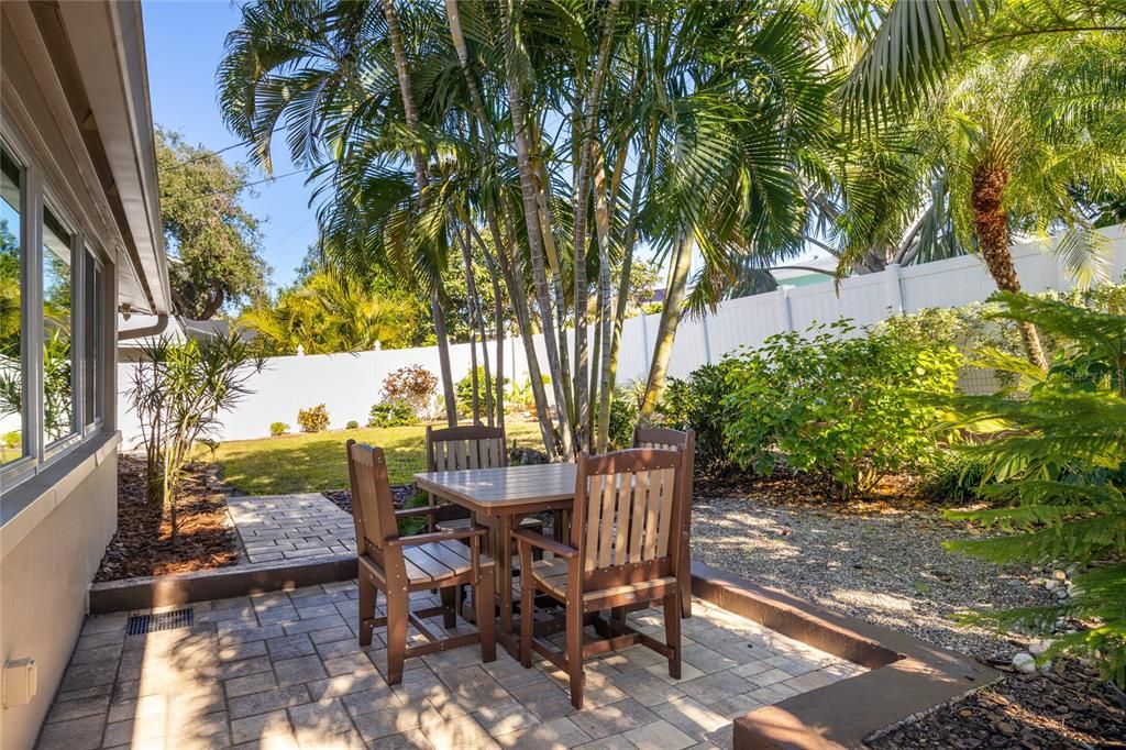 Right off of the back of the house is this nicely shaded patio.   Perfect for relaxing on the warmer days of the year where you still want to be outside but not in direct sun.