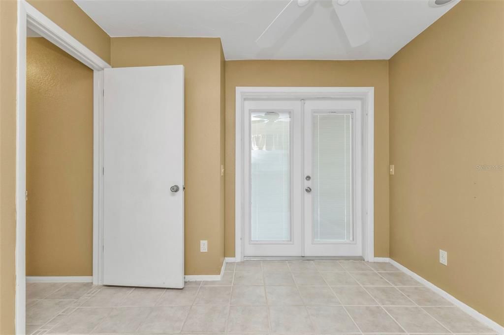 French doors to the pool from the guest room