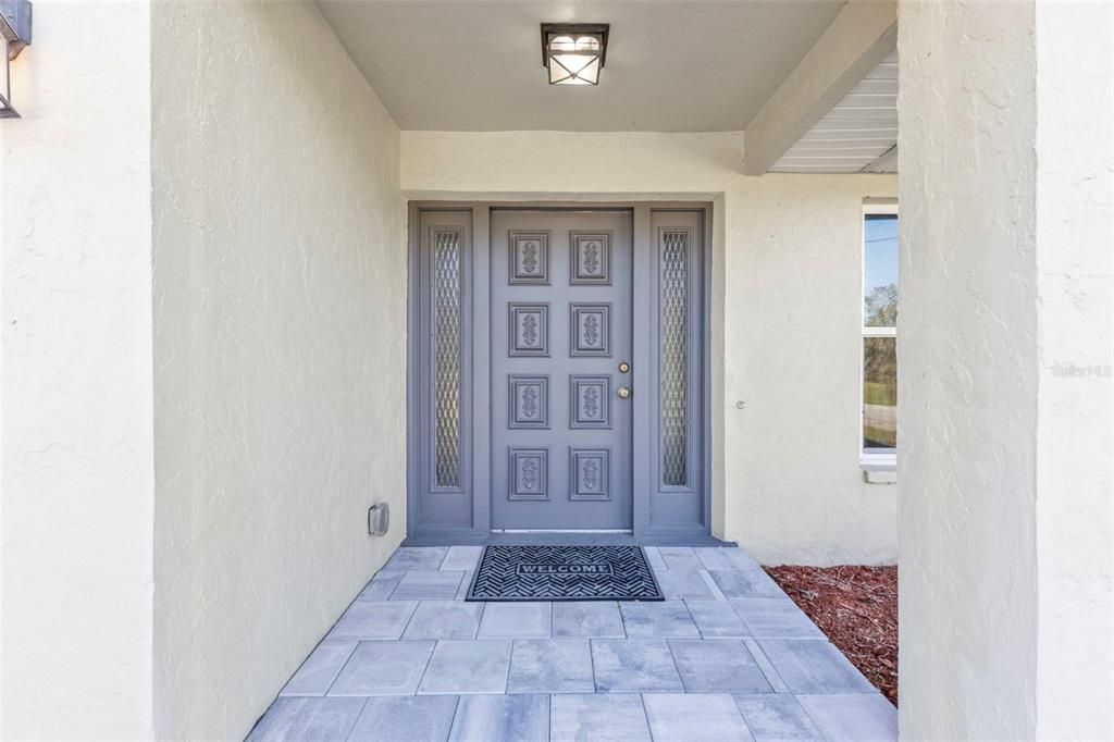 Recently paved covered entryway